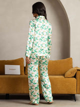 Women's green floral silk pajama set with notch collar and long sleeves