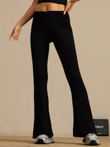Black high-waisted silk jersey flare pants with slim fit and full length