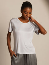 Model wearing light gray silk jersey short sleeve round neck women's T-shirt