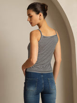 Black and white striped silk camisole top with spaghetti straps and square neckline, worn with jeans