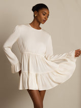 Cream silk A-line dress with ruffle sleeves and flared hem