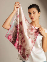 Model holding pink rose pattern 100% mulberry silk square scarf, 53x53cm