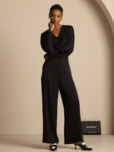 Black wide-leg high-waist silk blend pants styled on a model