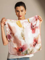 Woman holding pink-trim floral Mulberry silk square scarf, 53x53 cm