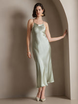 Light green silk spaghetti strap maxi dress with slim fit and midi length