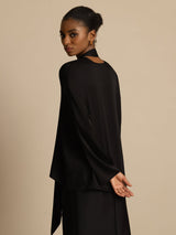 Black silk asymmetrical tie V-neck blouse with long sleeves, shown from the back