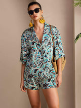 Women’s botanical print silk pajama set with short sleeve button-up shirt and shorts