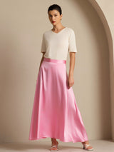 Model wearing pink silk A-line maxi skirt with lining and white top