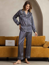 Navy silk pajama set with ginkgo print, long sleeve notch collar and contrast piping