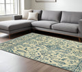 8' X 11' Ivory And Blue Oriental Area Rug With Fringe