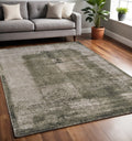 5' X 8' Green And Tan Abstract Distressed Area Rug
