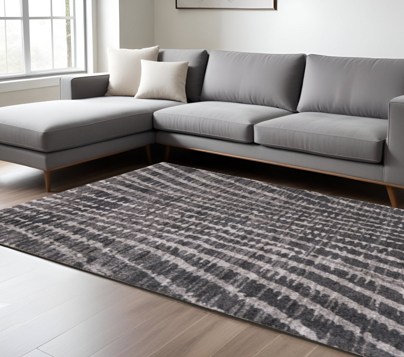 7' X 10' Black Gray And Ivory Abstract Area Rug