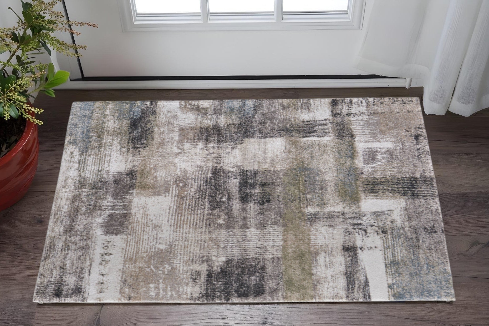 2' X 3' Gray Taupe And Ivory Abstract Distressed Area Rug