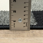 HomeRoots Polypropylene 2’x8’ Black and Ivory Gingham Indoor Outdoor Runner Rug