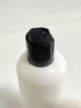 Black cap on SilkSilky 300ml laundry detergent bottle for silk and delicate care
