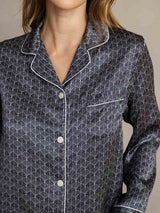 Women's navy silk pajama top with ginkgo print, notch collar and white piping
