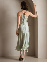 Light green silk spaghetti strap maxi dress with back tie detail