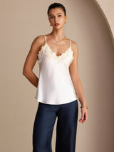[White] White silk spaghetti strap camisole with lace trim and V-neck, styled on model 003