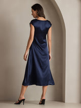 Back view of navy silk round neck cap sleeve midi dress with straight fit