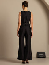 Back view of black silk-wool blend women’s V-neck vest with button detail and wide-leg trousers