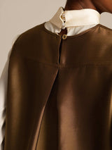 Brown silk-wool blend women's vest with cream high collar and button back closure