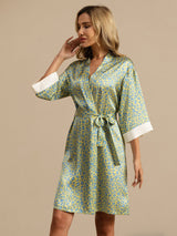 Leopard print silk kimono robe with belted waist and white cuff trim