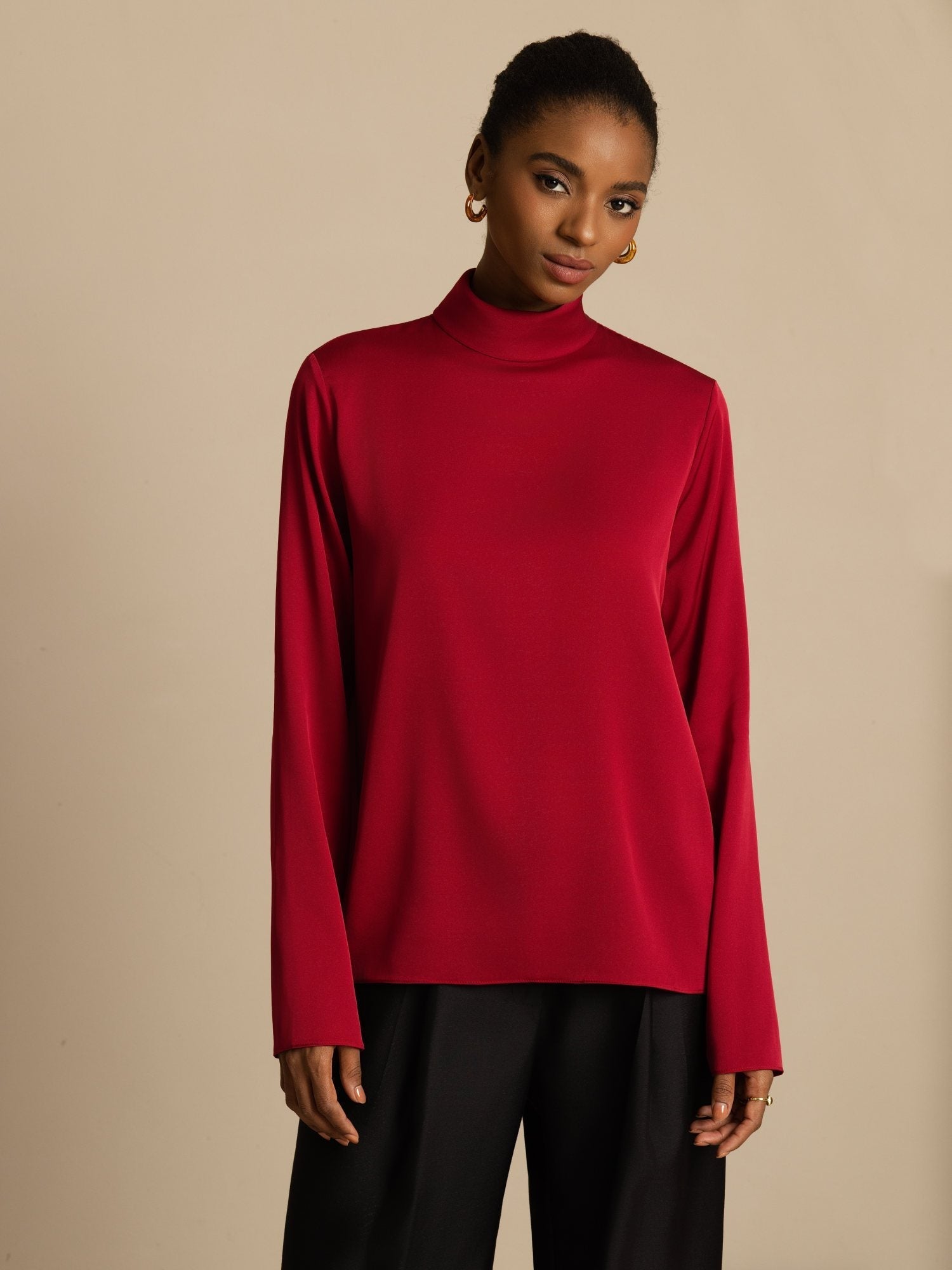Red silk women's turtleneck long sleeve top with smooth sheen