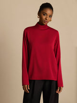 Red silk women's turtleneck long sleeve top with smooth sheen