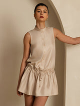 Beige sleeveless silk short dress with stand collar, button front and adjustable drawstring waist
