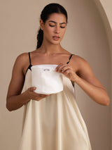 White bra laundry wash bag for delicate lingerie care, with zipper closure