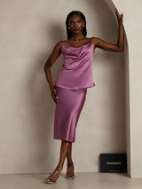 Model wearing lilac silk spaghetti strap cowl neck camisole with matching midi skirt