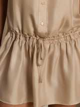 Beige silk sleeveless short dress with button front and adjustable drawstring drop waist