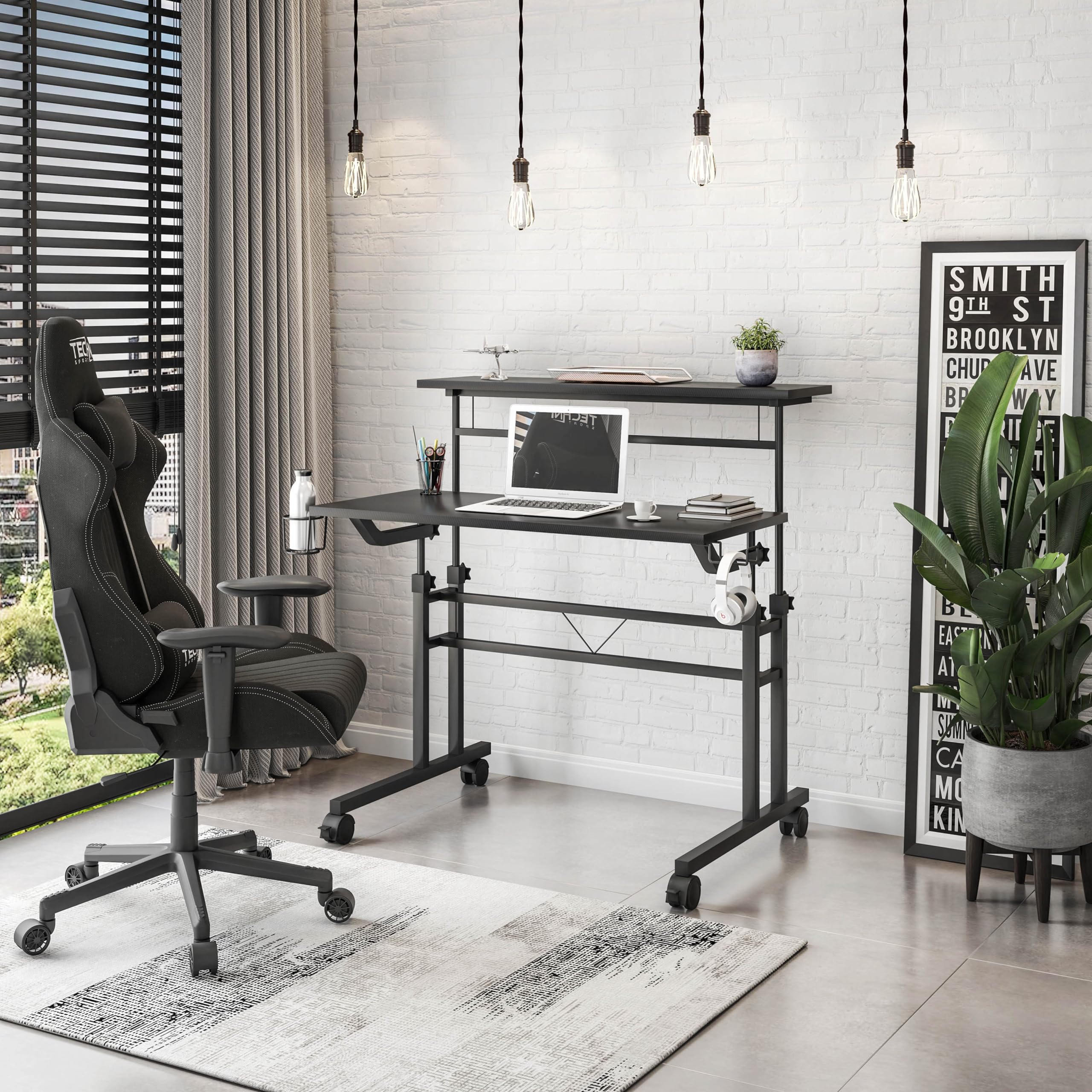 Techni Mobili Rolling Standing Desk, Two-Tier Height Adjustable Mobile Office or Gaming Desk with Wheels and Cup Holder, for Sitting or Standing Setups Black