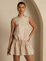 Beige silk sleeveless short dress with stand collar, button front and drawstring waist