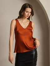Rust silk sleeveless V-neck tank top with straight fit and draped hem