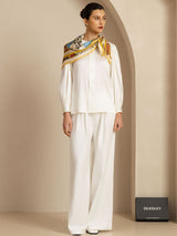 White silk cathedrals print square scarf styled on model with matching ivory outfit