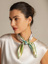 Multicolor 100% mulberry silk square scarf tied at neck, patchwork floral print