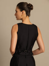 Back view of a black silk-wool blend women's vest with belt and sleeveless cut