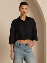 Black silk cropped blouse with lapel collar, half sleeves, and drawstring hem