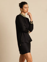 Black silk pleated stand collar blouse with gold trim and long sleeves