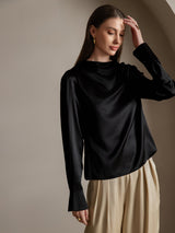 Black silk long sleeve boat neck blouse on model