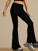 Black high-waisted silk flare pants with slim fit and flared hem