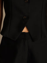 Black silk-wool blend women's vest with button front and V-neck hem