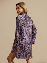 Woman wearing purple leopard print silk nightshirt with notch collar and high-low hem