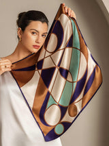 Geometric Mulberry silk square scarf in cream, navy, brown and mint tones