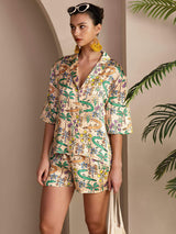 Model wearing multicolor crocodile print silk short sleeve pajama set with notch collar and shorts