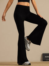 Black high-waisted silk flare pants with slim fit and full-length bell bottoms
