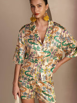 Woman wearing 19Momme mulberry silk crocodile print pajama set with short sleeves and shorts